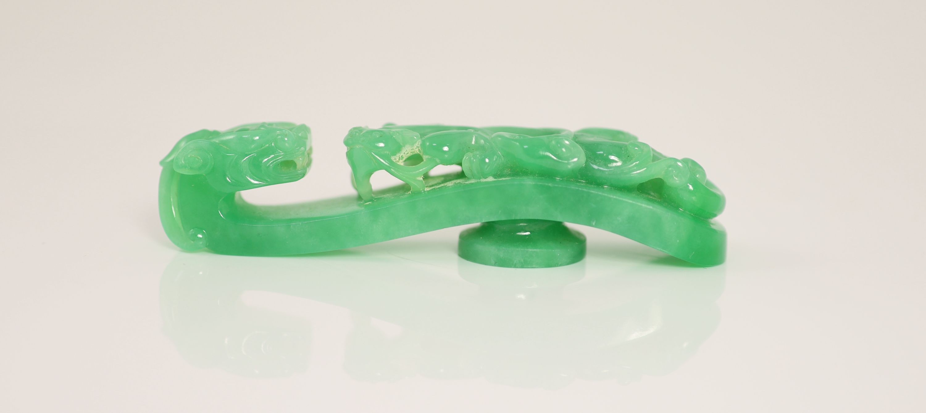 A Chinese jadeite ‘dragon’ belt hook, 8.8cm long
